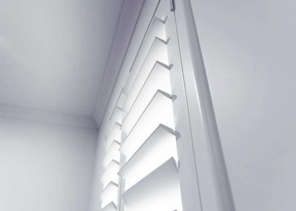 White PVC plantation shutters installed in a Perth home
