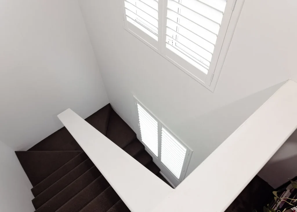 White PVC plantation shutters installed in a Perth home