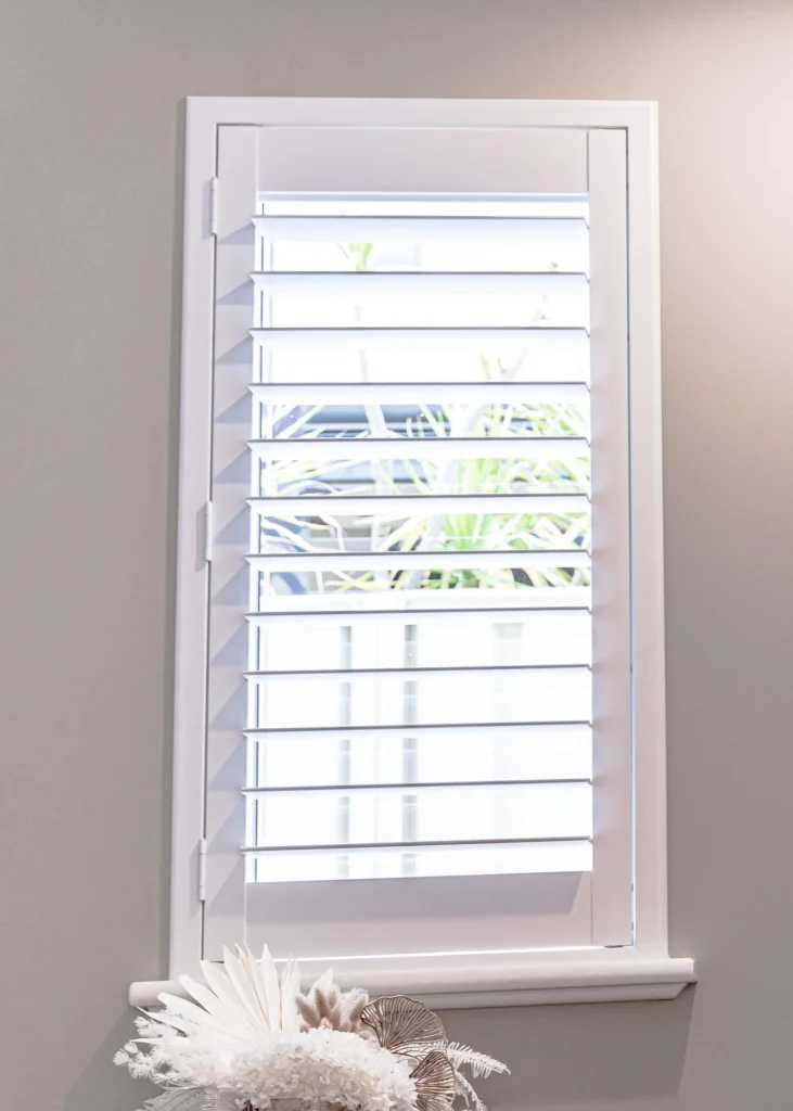 White PVC plantation shutters installed in a Perth home