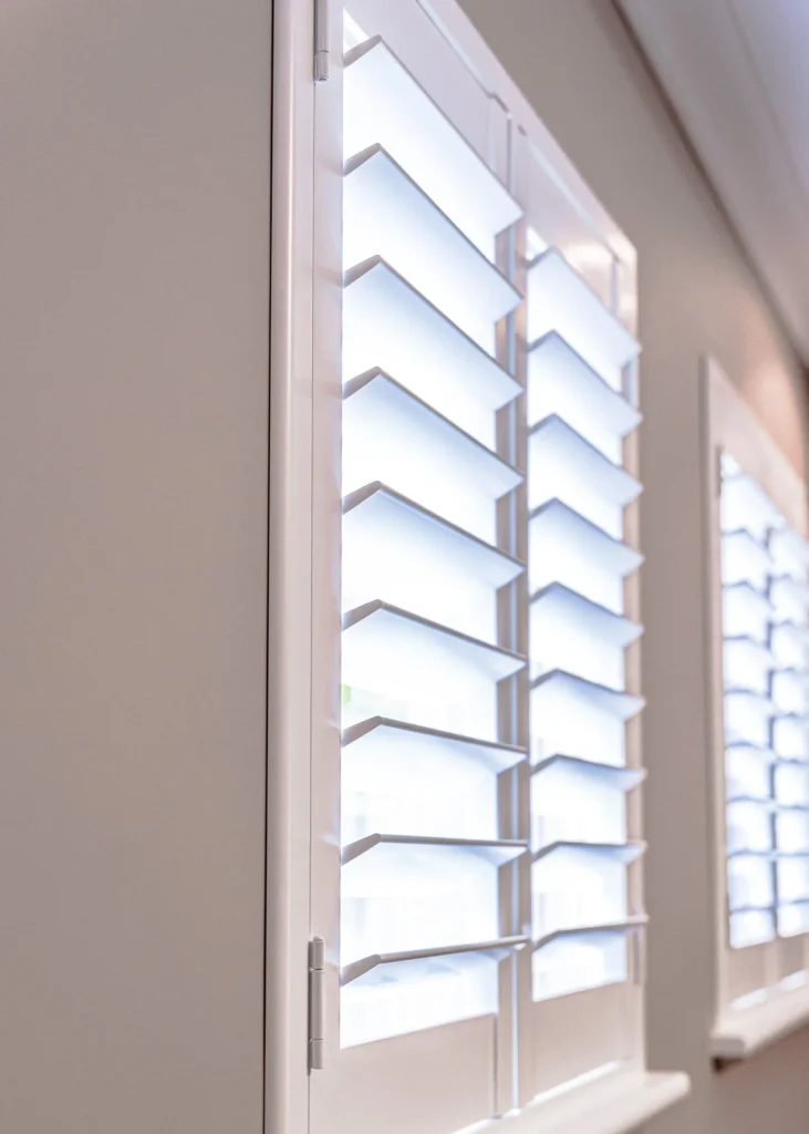 White PVC plantation shutters installed in a Perth home