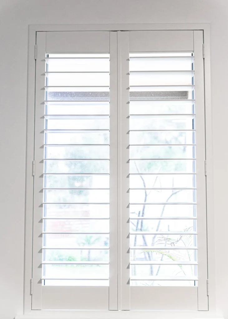 White PVC plantation shutters installed in a Perth home