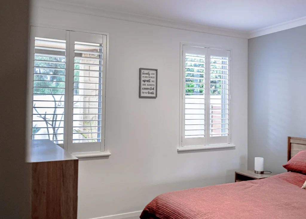 White PVC plantation shutters installed in a Perth home