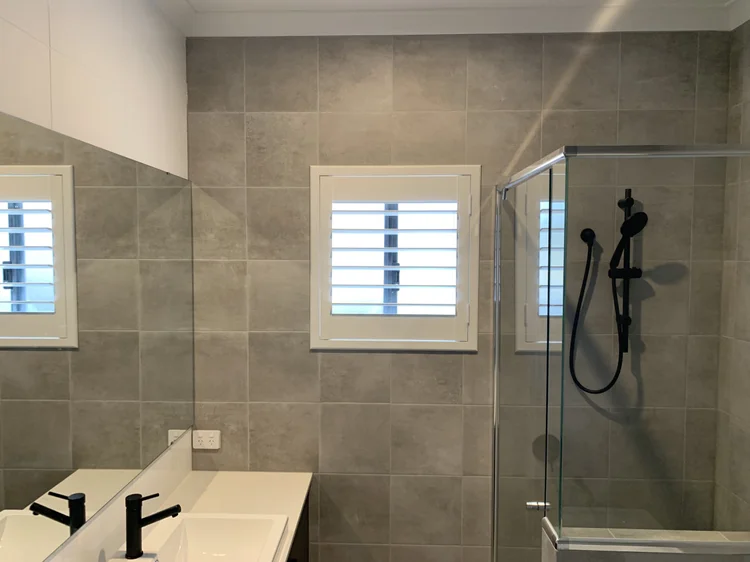 Plantation shutters in a bathroom