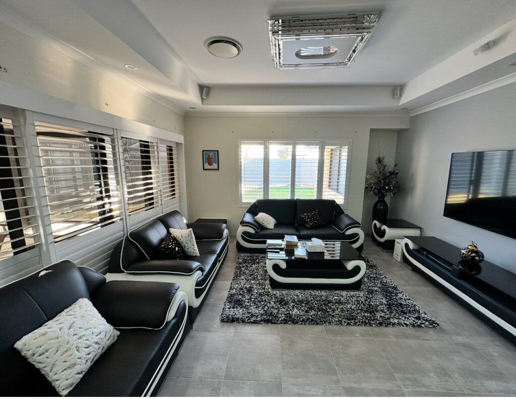 Sliding plantation shutters partly open