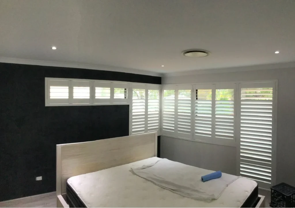 Plantation shutters made to fit a specially shaped window