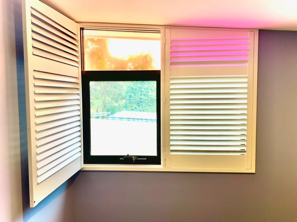 Plantation shutters made to fit a specially shaped window