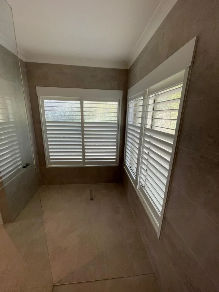 Plantation shutters fitted in a wet area