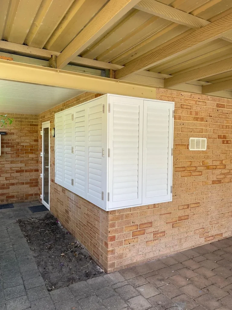 External aluminium plantation shutters on an outdoor area