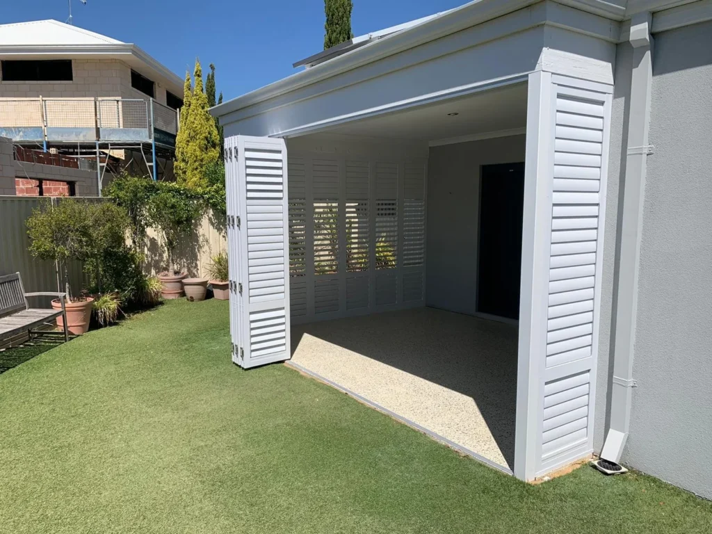 External aluminium plantation shutters on an outdoor area
