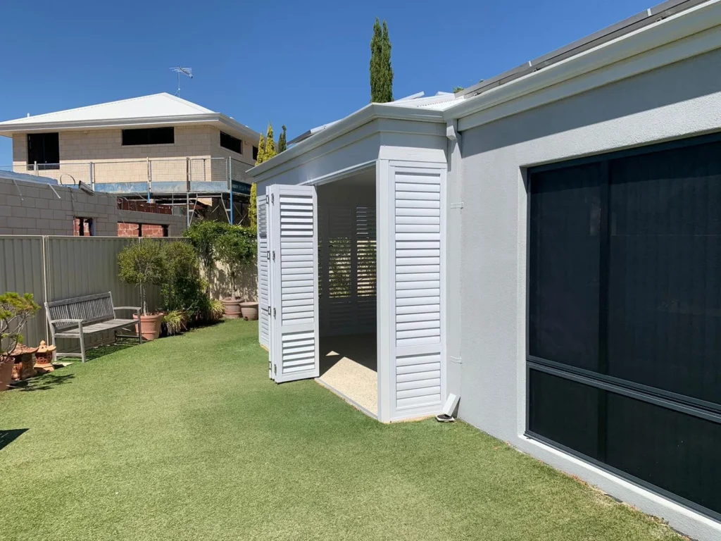 External aluminium plantation shutters on an outdoor area