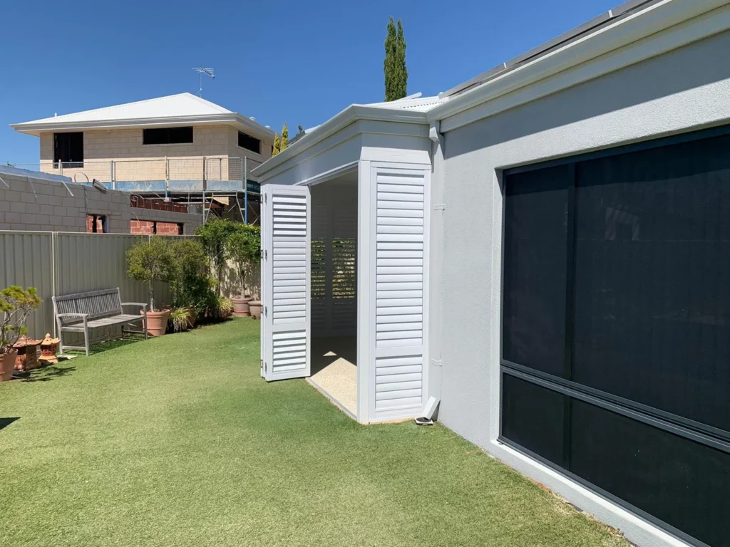 External aluminium plantation shutters on an outdoor area