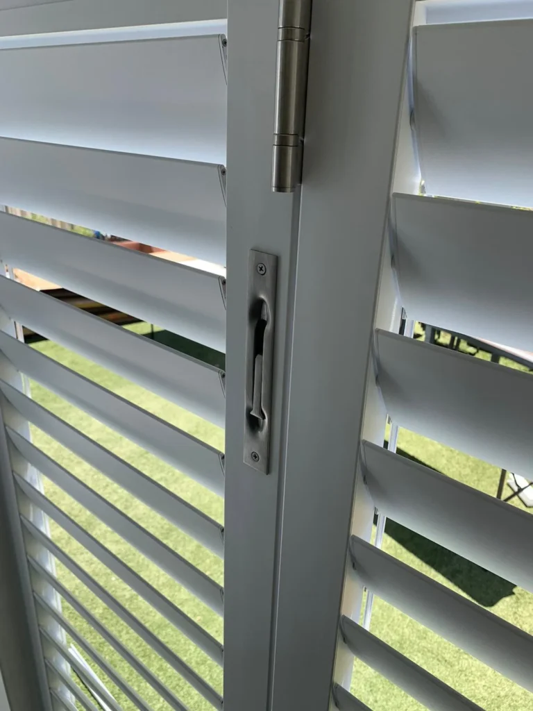 External aluminium plantation shutters on an outdoor area