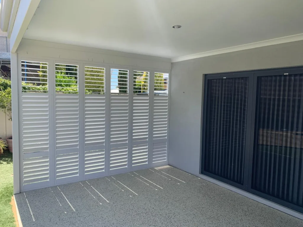 External aluminium plantation shutters on an outdoor area