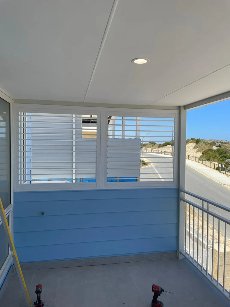 External aluminium plantation shutters on an outdoor area